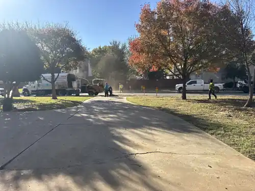 Clean Texas Tree Tops job site with company truck after tree work